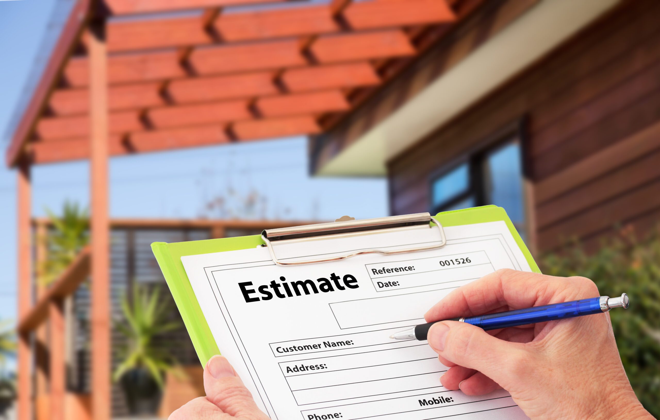 Hand,Writing,An,Estimate,For,Home,Building,Renovation